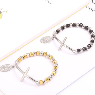 Stainless Steel Beaded Cross Bracelet with a Virgin Mary Tag